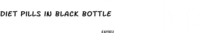 diet pills in black bottle