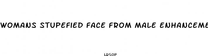 womans stupefied face from male enhancement ad